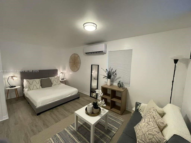 2993 SW 16th Ter, Miami, FL 33145 - bedroom with a wall mounted AC and wood finished floors