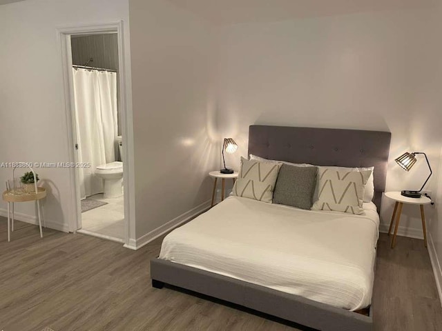 2993 SW 16th Ter, Miami, FL 33145 - bedroom with wood finished floors and ensuite bath