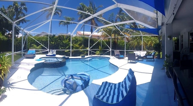547 Cascade Falls Dr, Weston, FL 33327 - view of swimming pool with a patio area, glass enclosure, and a pool with connected hot tub