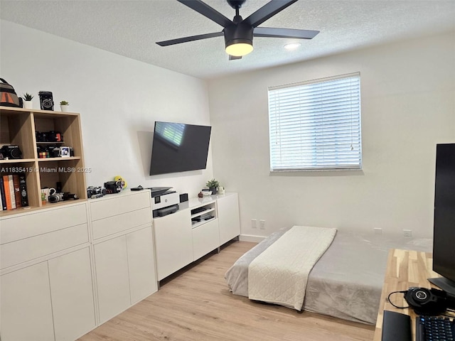 547 Cascade Falls Dr, Weston, FL 33327 - bedroom featuring light wood-style floors, a textured ceiling, and ceiling fan