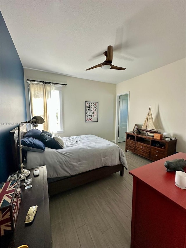 799 Hookline Cir, Loxahatchee, FL 33470 - bedroom with wood finished floors and a ceiling fan