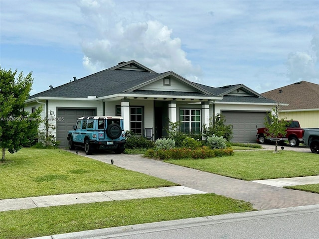 799 Hookline Cir, Loxahatchee, FL 33470 - single story home featuring an attached garage, a front lawn, driveway, and roof with shingles