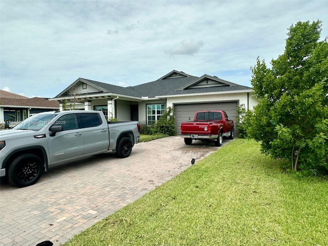 799 Hookline Cir, Loxahatchee, FL 33470 - ranch-style home featuring a garage, decorative driveway, a front lawn, and a shingled roof