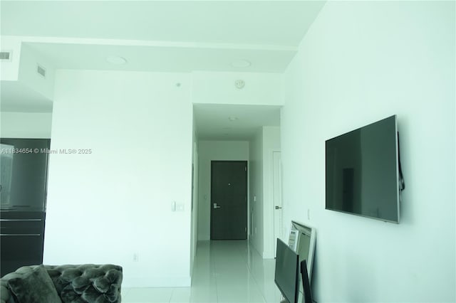 1080 Brickell Ave Unit 4209, Miami, FL 33131 - hallway featuring light tile patterned floors and baseboards
