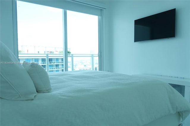 1080 Brickell Ave Unit 4209, Miami, FL 33131 - bedroom featuring multiple windows