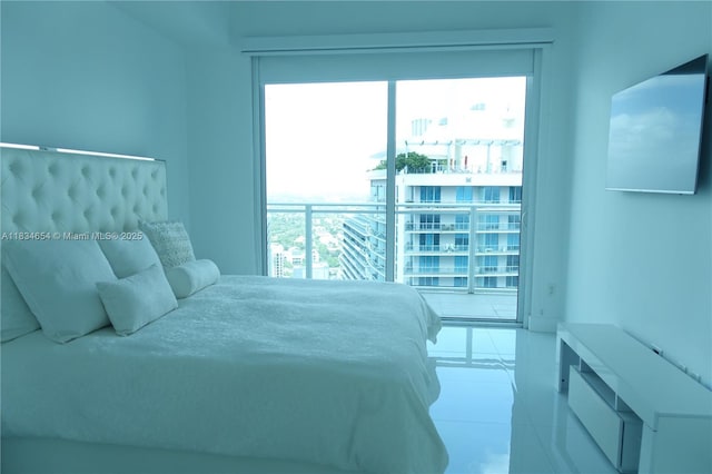 1080 Brickell Ave Unit 4209, Miami, FL 33131 - bedroom with multiple windows, a view of city, and tile patterned flooring