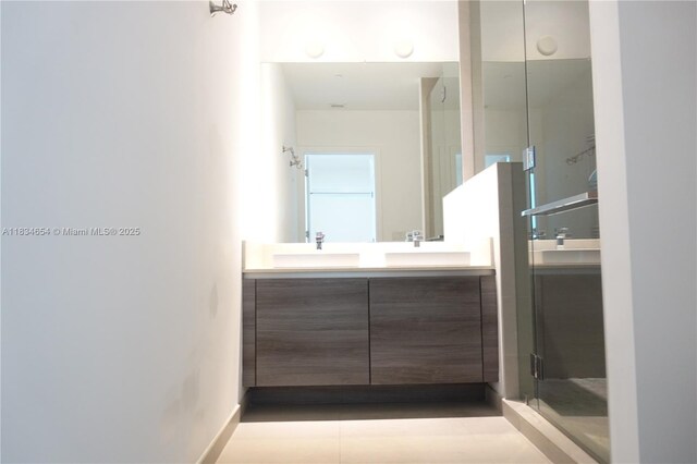 1080 Brickell Ave Unit 4209, Miami, FL 33131 - bathroom with double vanity and a shower with door