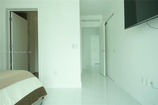 1080 Brickell Ave Unit 4209, Miami, FL 33131 - bedroom with tile patterned flooring and baseboards