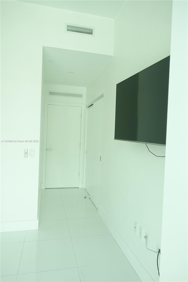 1080 Brickell Ave Unit 4209, Miami, FL 33131 - hall featuring tile patterned floors and baseboards