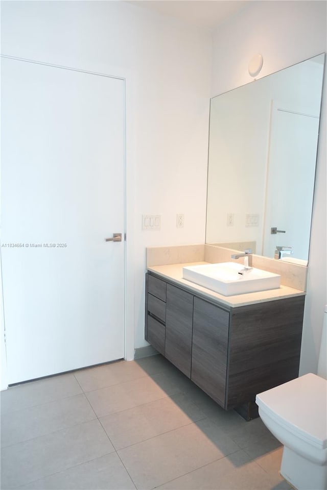 1080 Brickell Ave Unit 4209, Miami, FL 33131 - bathroom featuring vanity and tile patterned flooring
