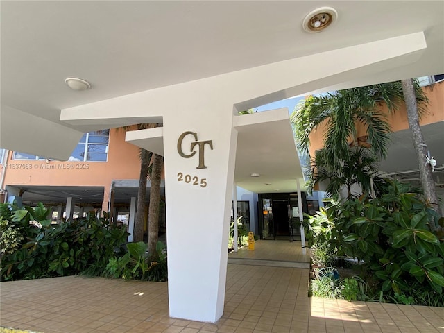 2025 NE 164th St Unit 807, North Miami Beach, FL 33162 - doorway to property with stucco siding