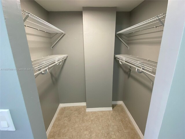 2025 NE 164th St Unit 807, North Miami Beach, FL 33162 - view of walk in closet