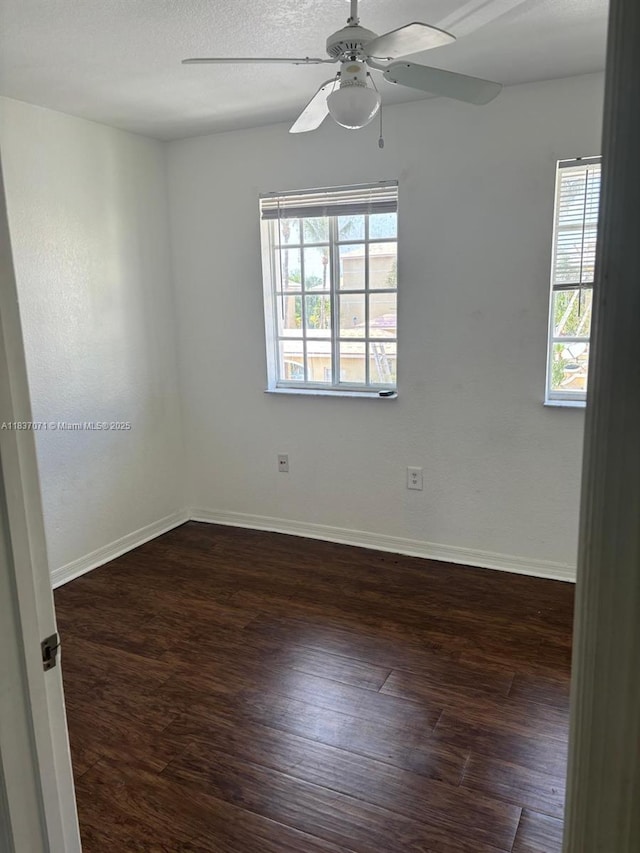 2050 NE 167th St Unit 3-124, North Miami Beach, FL 33162 - unfurnished room featuring plenty of natural light, dark wood-type flooring, and a ceiling fan