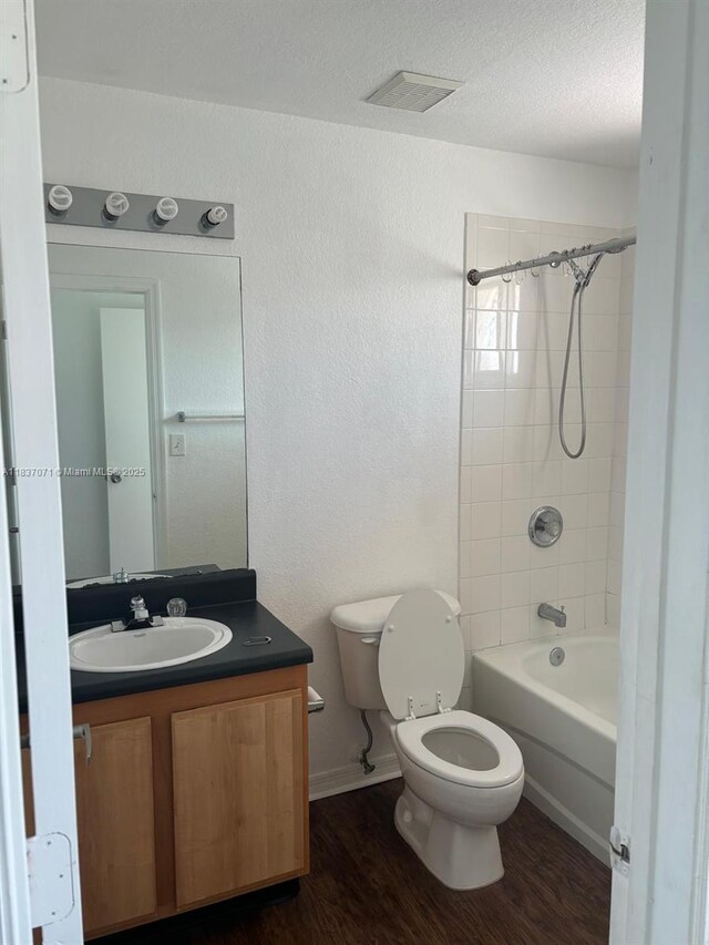 2050 NE 167th St Unit 3-124, North Miami Beach, FL 33162 - bathroom with wood finished floors, vanity, and shower / bath combination