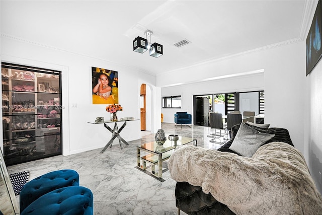 11055 NW 59th Ct, Hialeah, FL 33012 - living area featuring marble tiled flooring, arched walkways, and crown molding