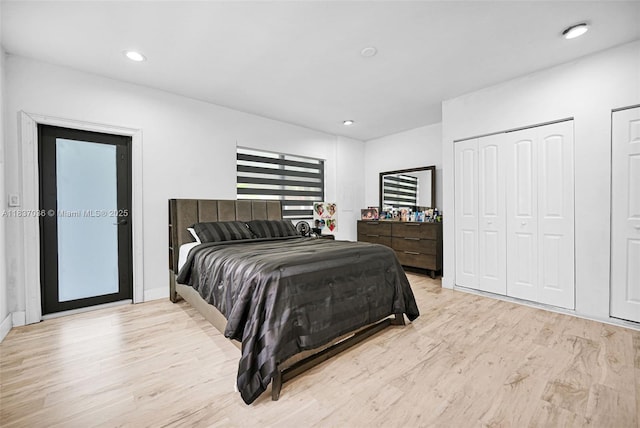 11055 NW 59th Ct, Hialeah, FL 33012 - bedroom with wood finished floors, multiple closets, and recessed lighting