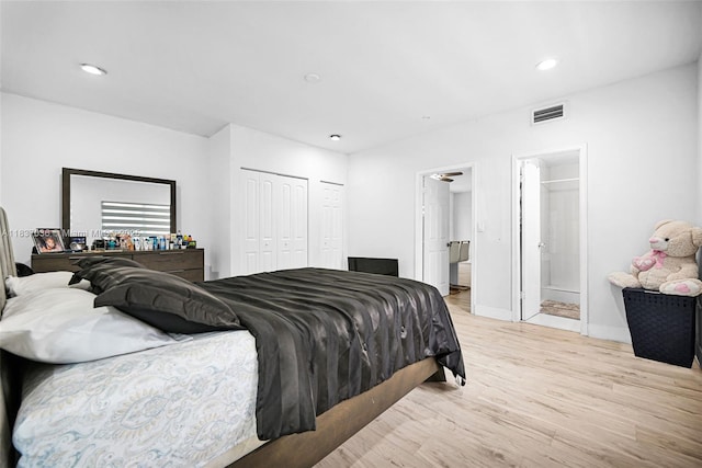 11055 NW 59th Ct, Hialeah, FL 33012 - bedroom with light wood-style floors and recessed lighting