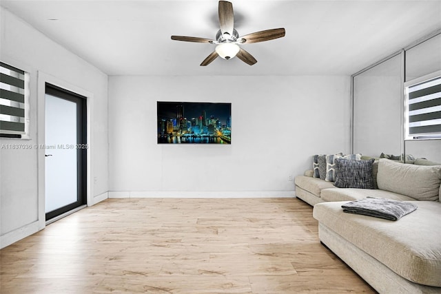 11055 NW 59th Ct, Hialeah, FL 33012 - living room featuring wood finished floors and ceiling fan