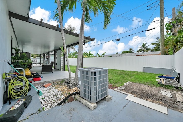 11055 NW 59th Ct, Hialeah, FL 33012 - fenced backyard featuring a patio area