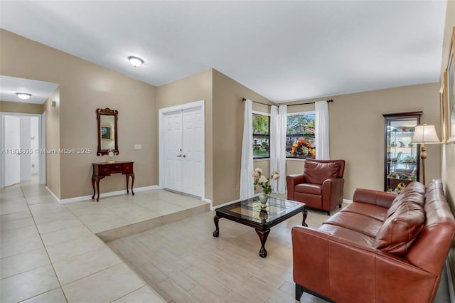 11321 NW 1st Ct, Coral Springs, FL 33071 - living area featuring baseboards and lofted ceiling