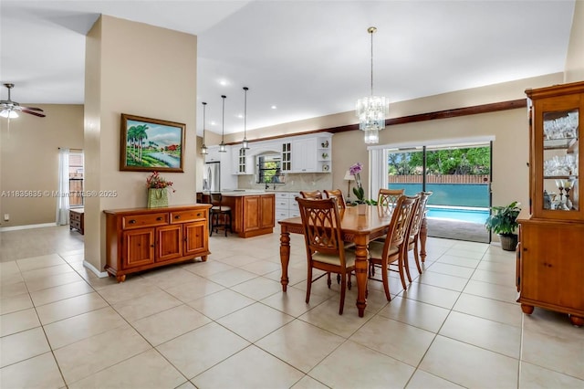 11321 NW 1st Ct, Coral Springs, FL 33071 - dining area featuring a ceiling fan, a chandelier, healthy amount of natural light, recessed lighting, and light tile patterned floors
