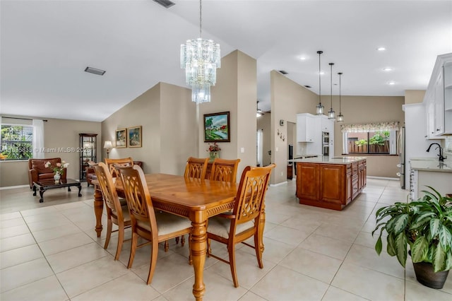 11321 NW 1st Ct, Coral Springs, FL 33071 - dining room featuring light tile patterned floors, a chandelier, high vaulted ceiling, and recessed lighting