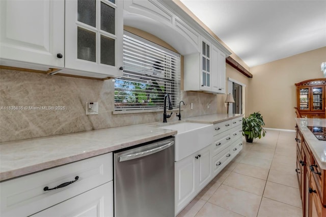 11321 NW 1st Ct, Coral Springs, FL 33071 - kitchen with dishwasher, tasteful backsplash, light tile patterned floors, light stone countertops, and glass insert cabinets