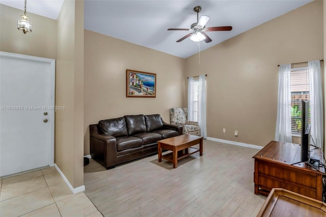 11321 NW 1st Ct, Coral Springs, FL 33071 - living area with lofted ceiling, ceiling fan, plenty of natural light, and light wood-type flooring