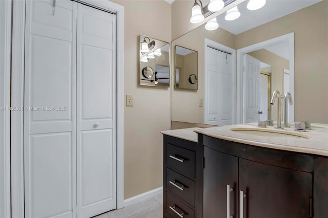 11321 NW 1st Ct, Coral Springs, FL 33071 - bathroom featuring vanity, tile patterned floors, and a closet