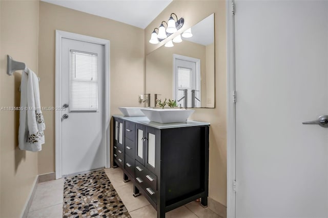 11321 NW 1st Ct, Coral Springs, FL 33071 - bathroom featuring double vanity, plenty of natural light, and tile patterned floors