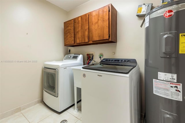 11321 NW 1st Ct, Coral Springs, FL 33071 - laundry area featuring water heater, independent washer and dryer, cabinet space, and light tile patterned floors