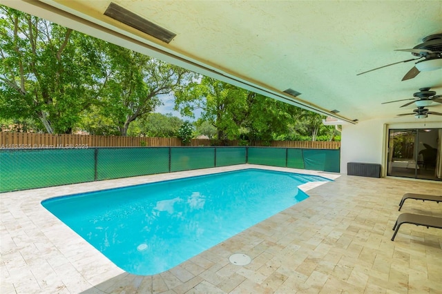 11321 NW 1st Ct, Coral Springs, FL 33071 - view of swimming pool with ceiling fan, a fenced backyard, and a patio