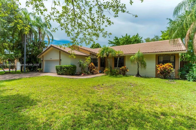 11321 NW 1st Ct, Coral Springs, FL 33071 - ranch-style house with a tile roof, driveway, an attached garage, and a front yard