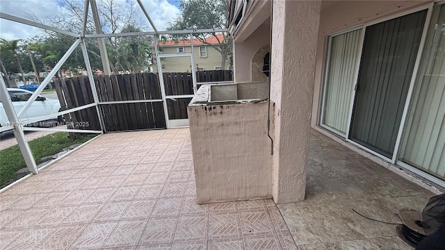 1244 NW 171st Ave, Pembroke Pines, FL 33028 - view of patio / terrace with glass enclosure