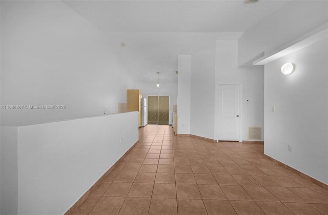 7506 W 20th Ave Unit 206, Hialeah, FL 33016 - empty room featuring tile patterned flooring and baseboards