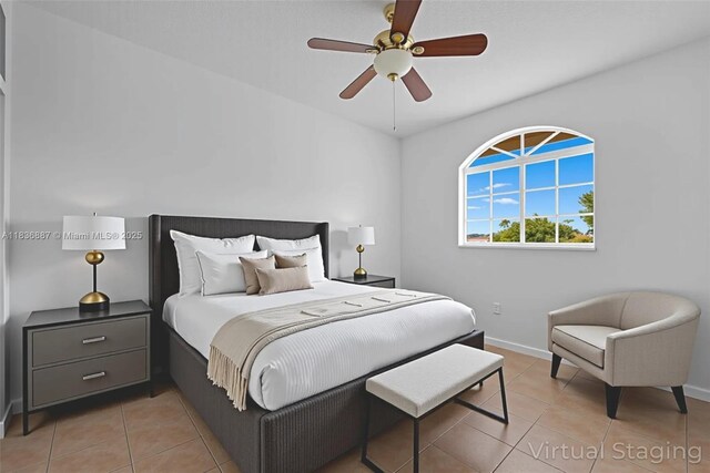 7506 W 20th Ave Unit 206, Hialeah, FL 33016 - bedroom featuring light tile patterned flooring and a ceiling fan