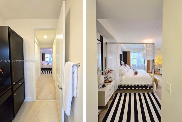 2954 NW 124th Way, Sunrise, FL 33323 - bedroom with light carpet and light tile patterned flooring