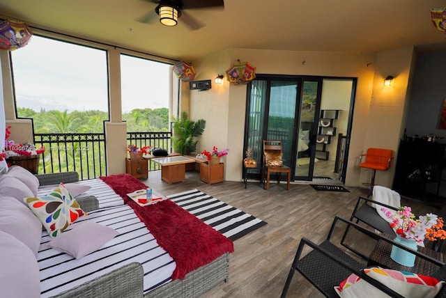 2954 NW 124th Way, Sunrise, FL 33323 - living room featuring a ceiling fan and wood finished floors