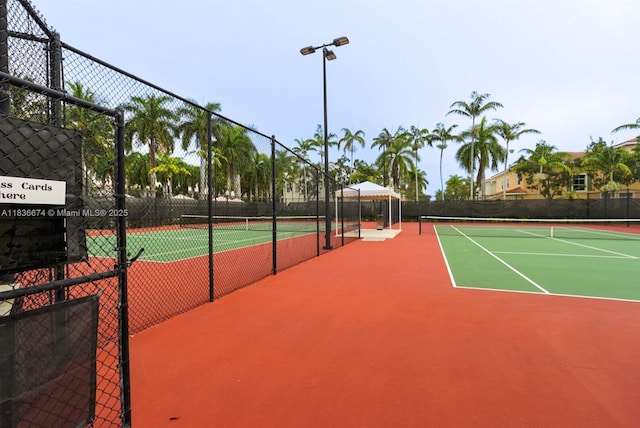 2954 NW 124th Way, Sunrise, FL 33323 - view of tennis court featuring community basketball court