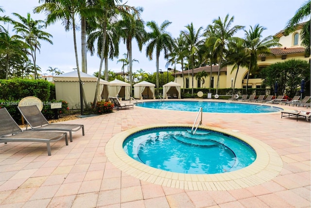 2954 NW 124th Way, Sunrise, FL 33323 - community pool with a patio area and a community hot tub