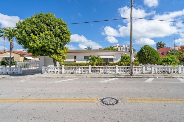 201 NW 14th Ave, Miami, FL 33125 - view of front of house featuring a fenced front yard