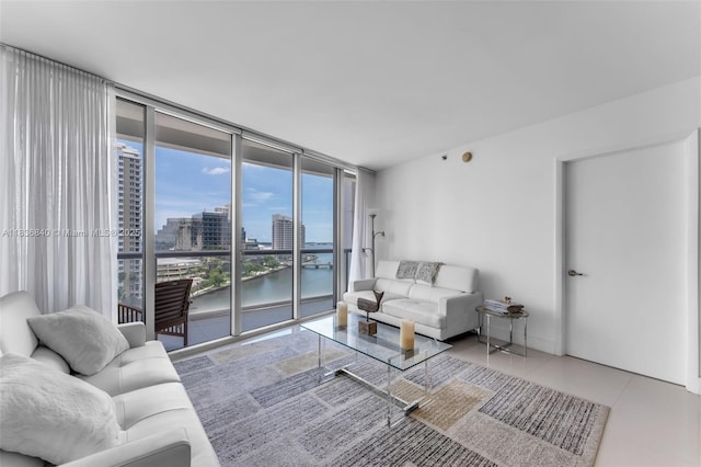 495 Brickell Ave Unit Bay1007, Miami, FL 33131 - living area featuring a wall of windows, a water view, and a city view