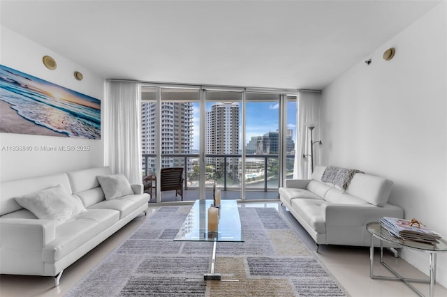 495 Brickell Ave Unit Bay1007, Miami, FL 33131 - living room featuring a wall of windows and a city view