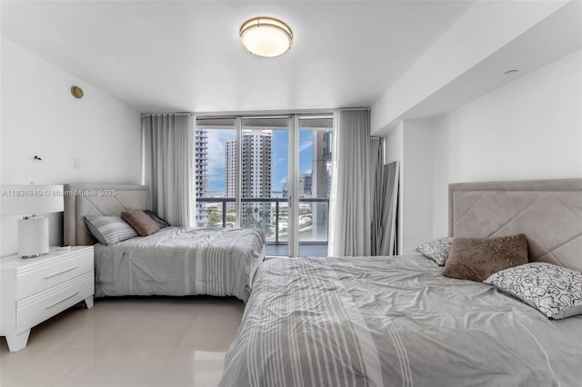 495 Brickell Ave Unit Bay1007, Miami, FL 33131 - tiled bedroom with a city view