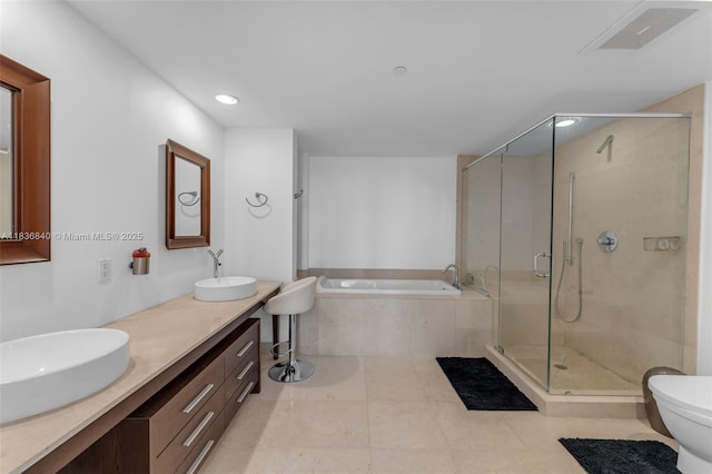 495 Brickell Ave Unit Bay1007, Miami, FL 33131 - full bath with a bath, double vanity, a shower stall, and recessed lighting