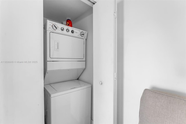 495 Brickell Ave Unit Bay1007, Miami, FL 33131 - washroom featuring estacked washer and dryer