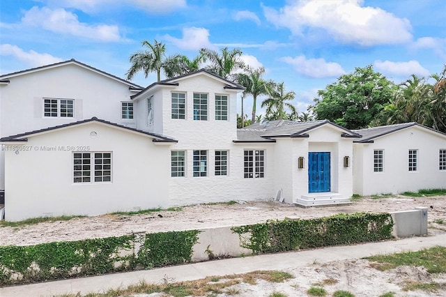 309 NE 99th St, Miami Shores, FL 33138 - view of front of property with stucco siding and entry steps