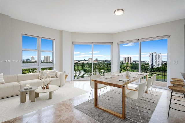 20000 E Country Club Dr Unit Ts02, Aventura, FL 33180 - dining space featuring a view of skyline and plenty of natural light