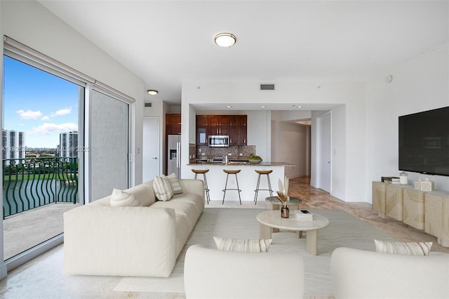 20000 E Country Club Dr Unit Ts02, Aventura, FL 33180 - living area featuring baseboards