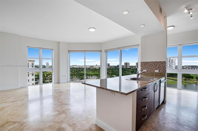 20000 E Country Club Dr Unit Ts02, Aventura, FL 33180 - kitchen featuring stone counters, open floor plan, dark brown cabinets, a view of city, and dishwasher